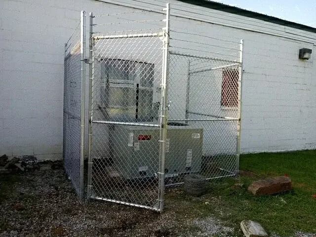 Screened enclosure concealing a dumpster in Oklahoma City