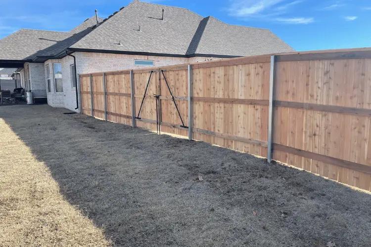 Wood privacy fence and gate securing a backyard in Oklahoma City