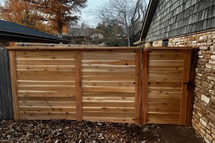 Cedar wood privacy fence under construction in the Oklahoma City metro