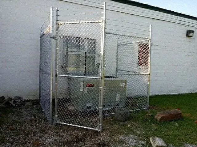 Screened enclosure concealing a dumpster in Oklahoma City