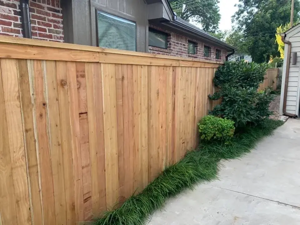 Cedar cap and trim wood privacy fence installed in Oklahoma City