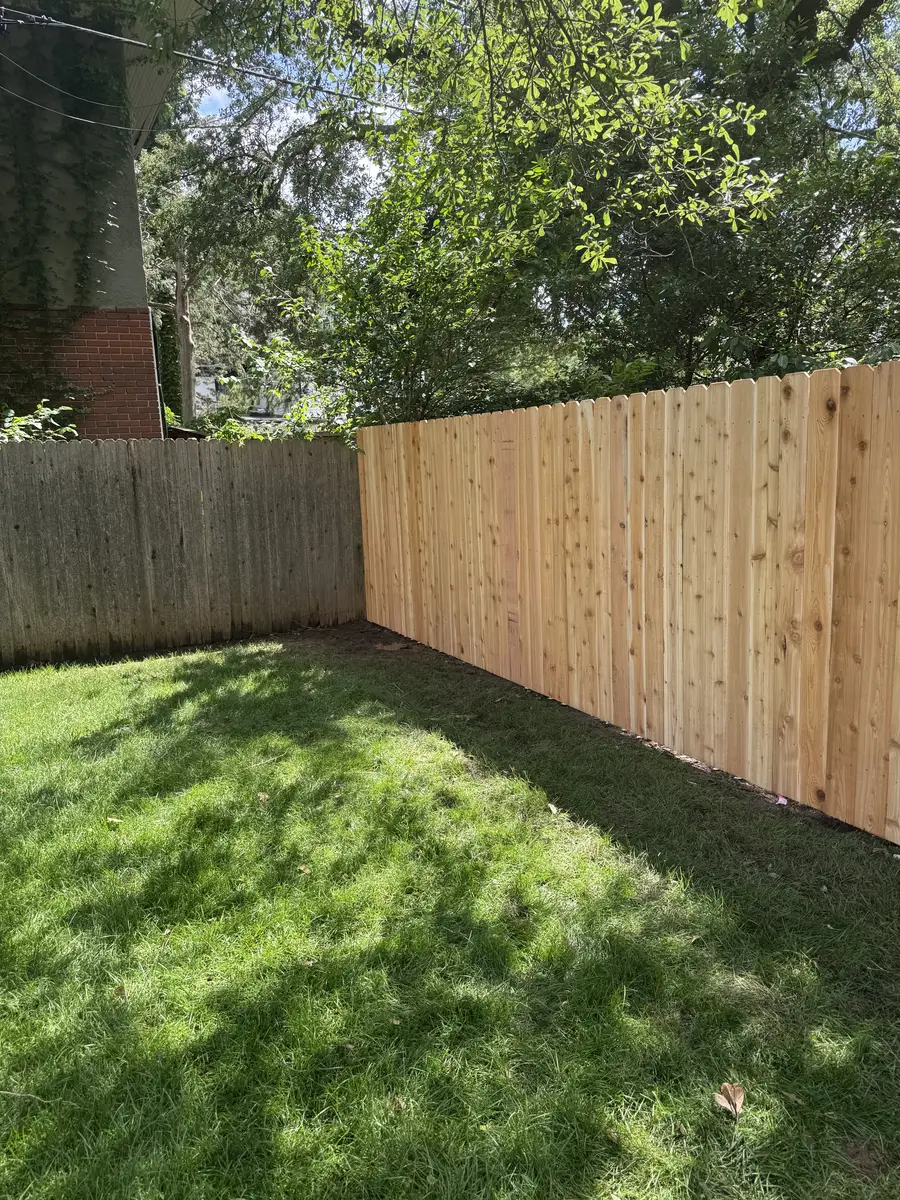 Cedar privacy fence along an Oklahoma City back yard