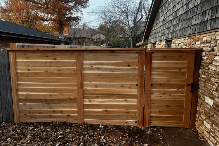 Cedar wood privacy fence under construction in the Oklahoma City metro