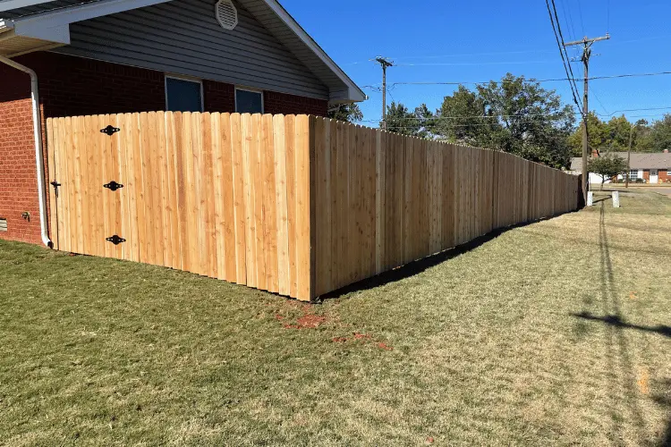 Cedar privacy fence installation in progress in the Oklahoma City metro