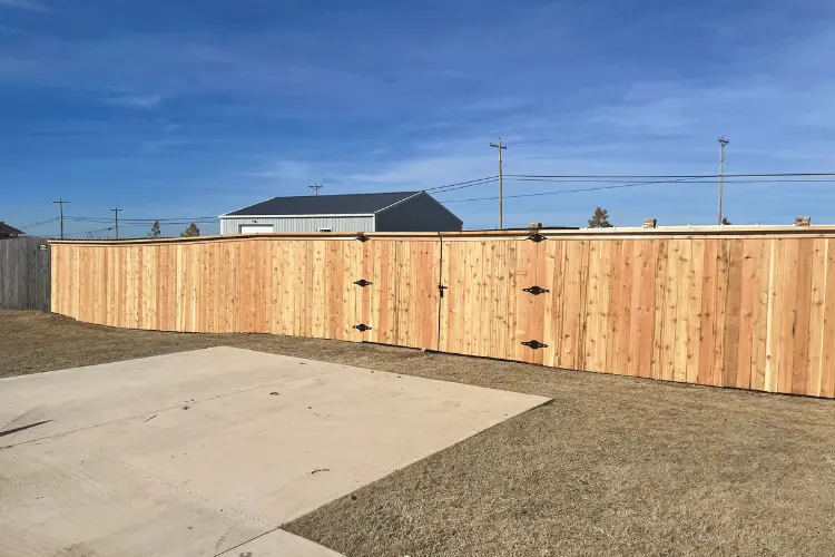 Cedar privacy fence in the Oklahoma City metro after storm season
