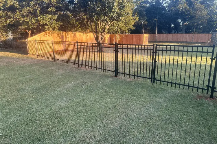 Black wrought iron fence installed at an Oklahoma City property